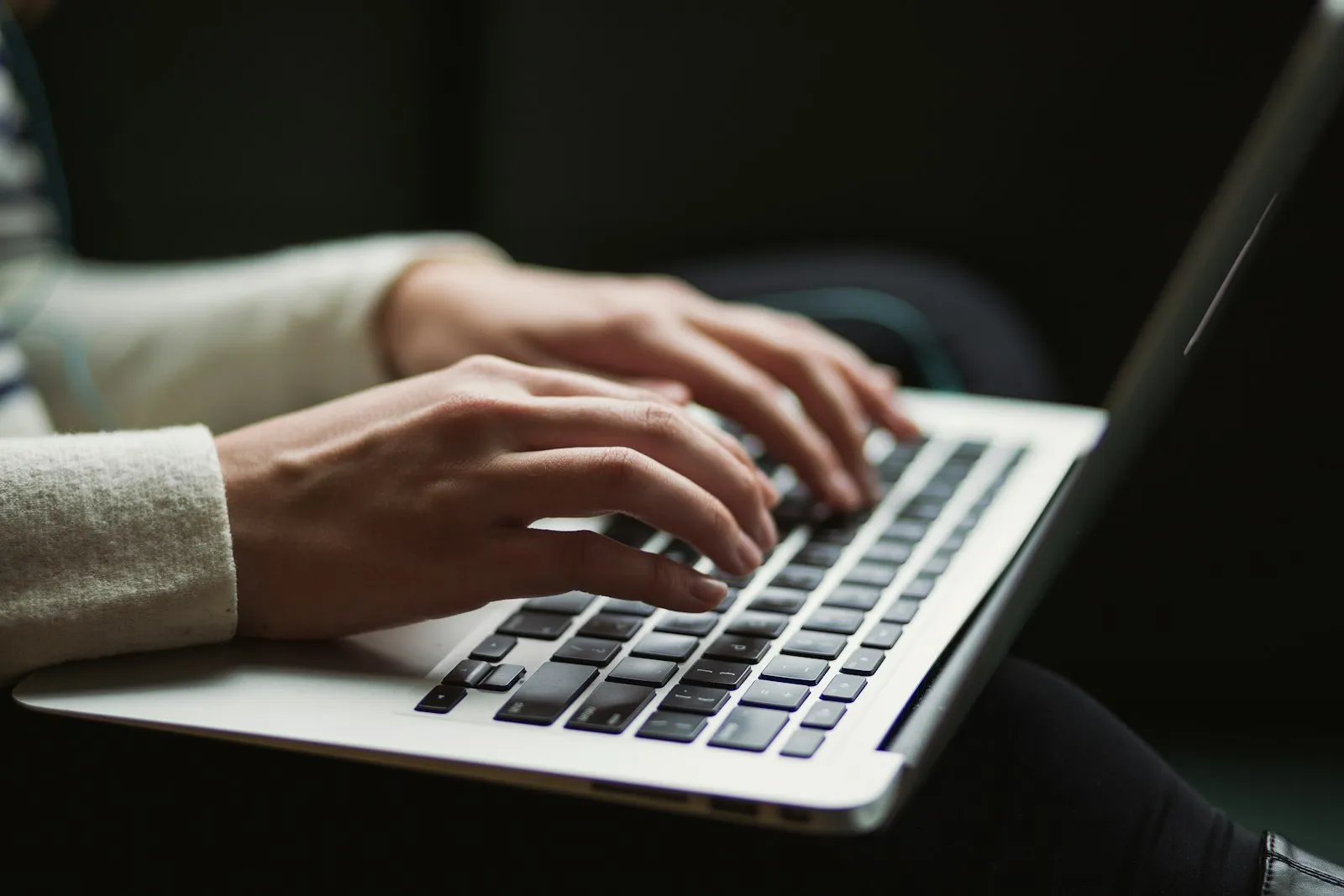 A candidate working through an exam on a laptop