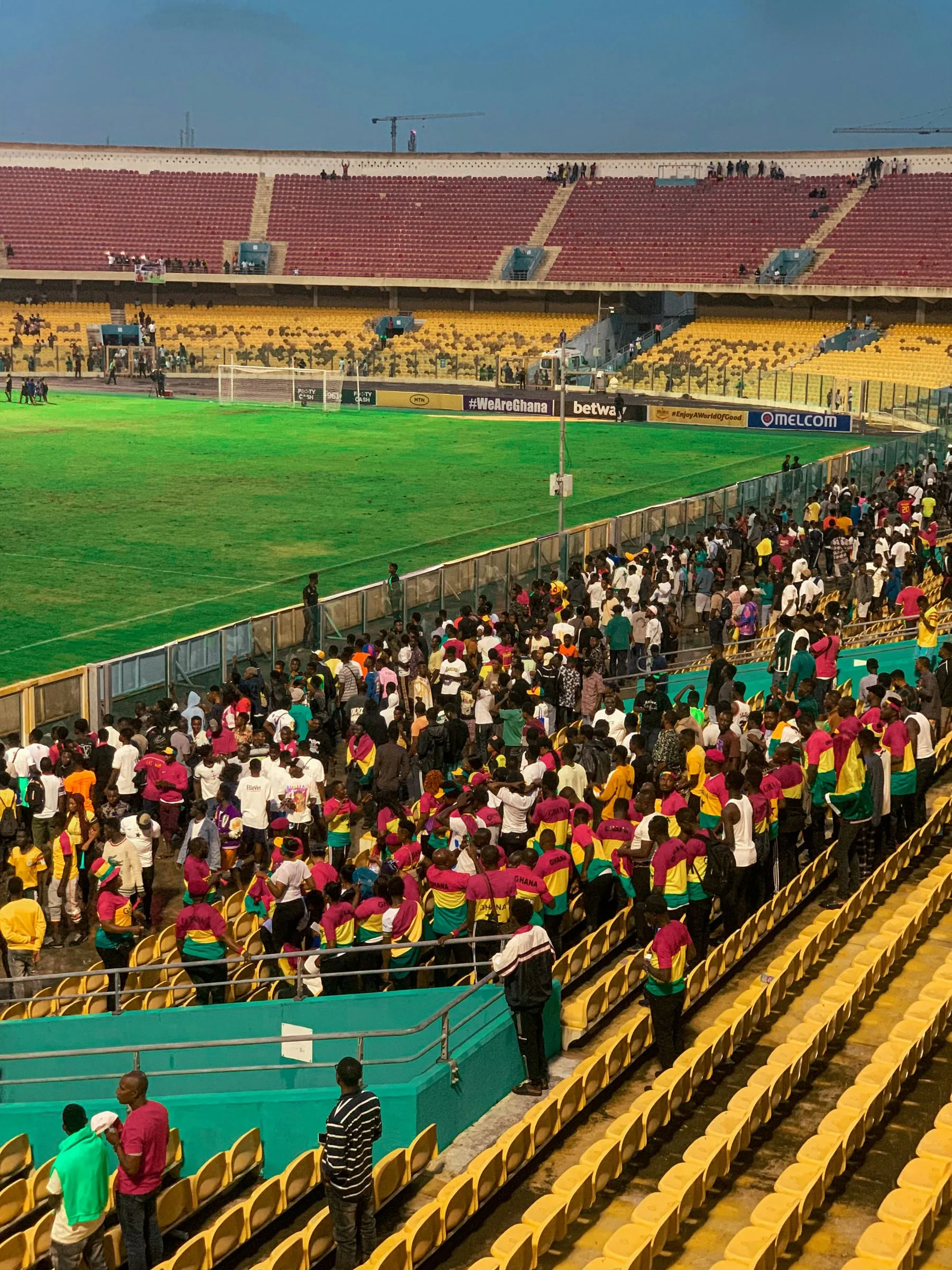A packed stadium in Accra, standing in for high-volume national testing